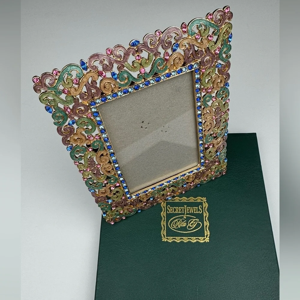 Secret Jewels by Rita G ornate frame.  New in  box. Measures 5” (W) X 6” (L).